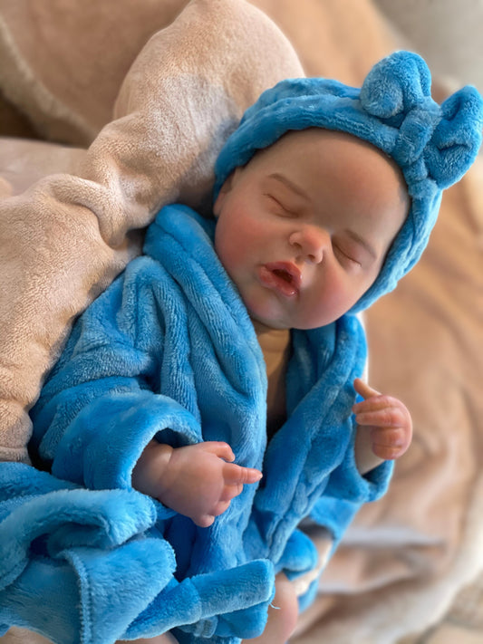 Lifelike Newborn Baby Doll sleeping in bathrob