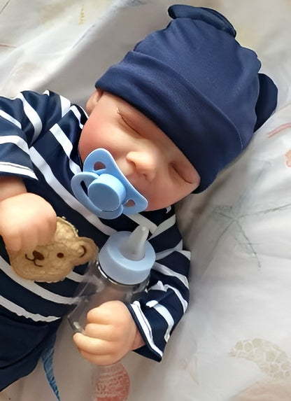Poupée bébé reborn garçon endormi